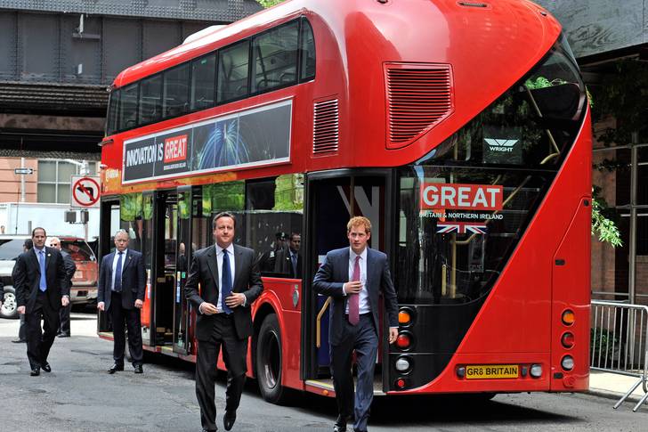 Oh, look—Prince Harry brought a double-decker bus AND Prime Minister David Cameron!